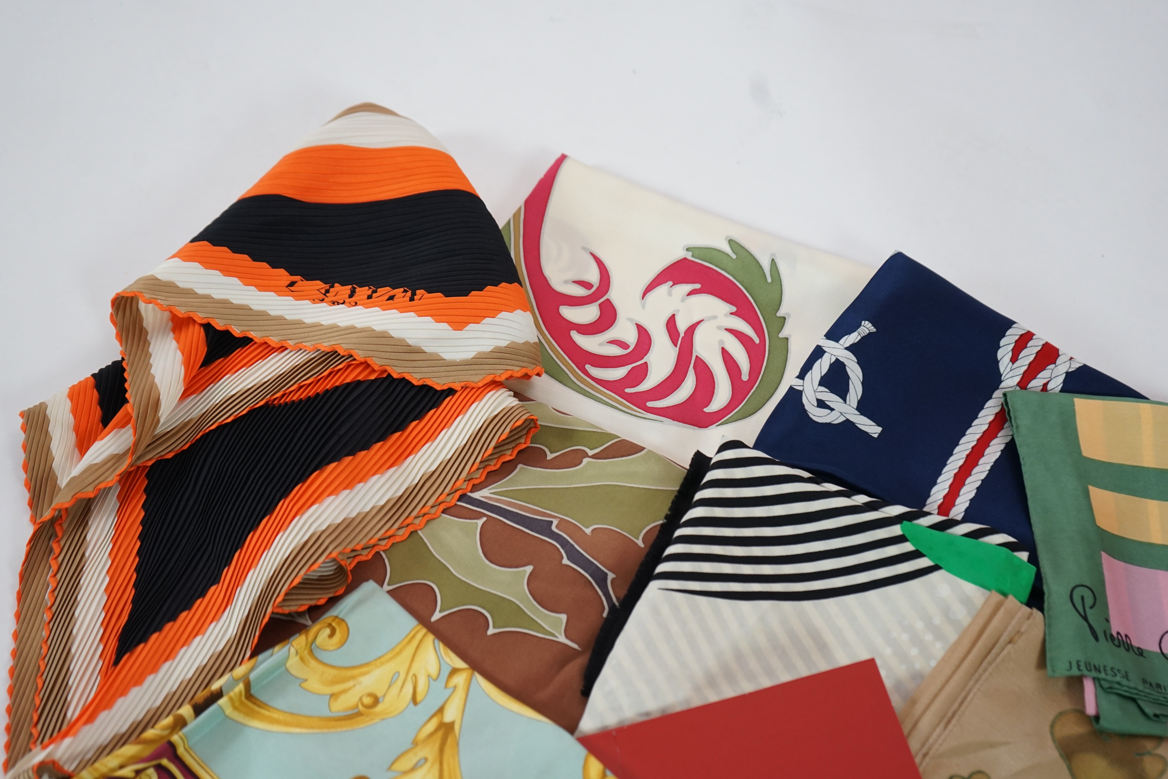 A group of eight silk scarves including Escada, Pierre Cardin, Lanvin, Salvatore Ferragamo and Kreier